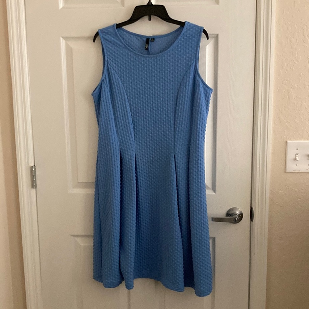 Baby blue sleeveless dress.